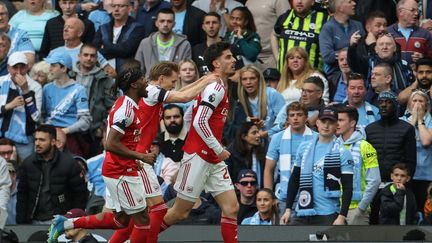 Arsenal players celebrating their Premier League title