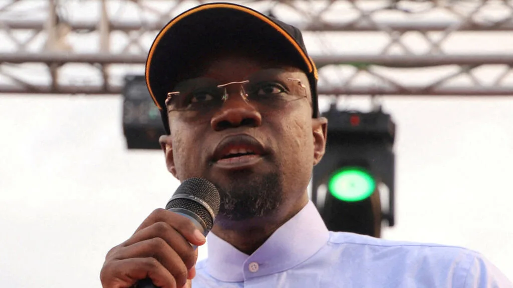 Ousmane Sonko addressing the media in Dakar