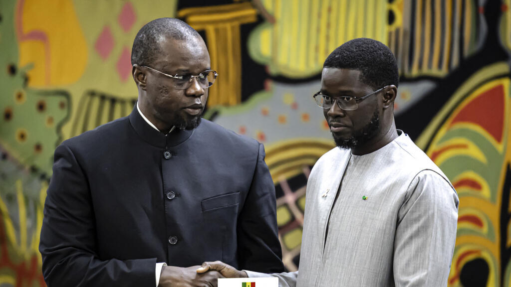 Former Senegalese Prime Minister Ousmane Sonko (left) and President Bassirou Diomaye Faye (right) at the presidential palace in Dakar on October 16, 2025.