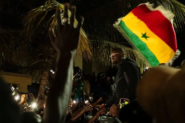 Supporters celebrate Ousmane Sonko's return to Dakar after his dismissal