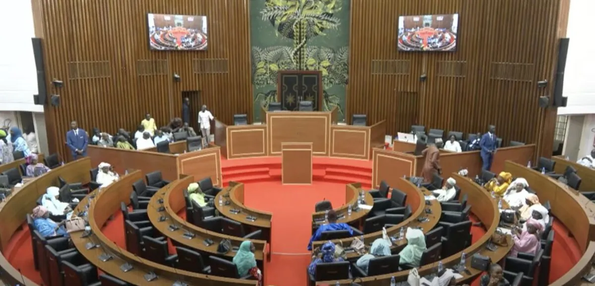 Senegal’s National Assembly building with political figures in discussion