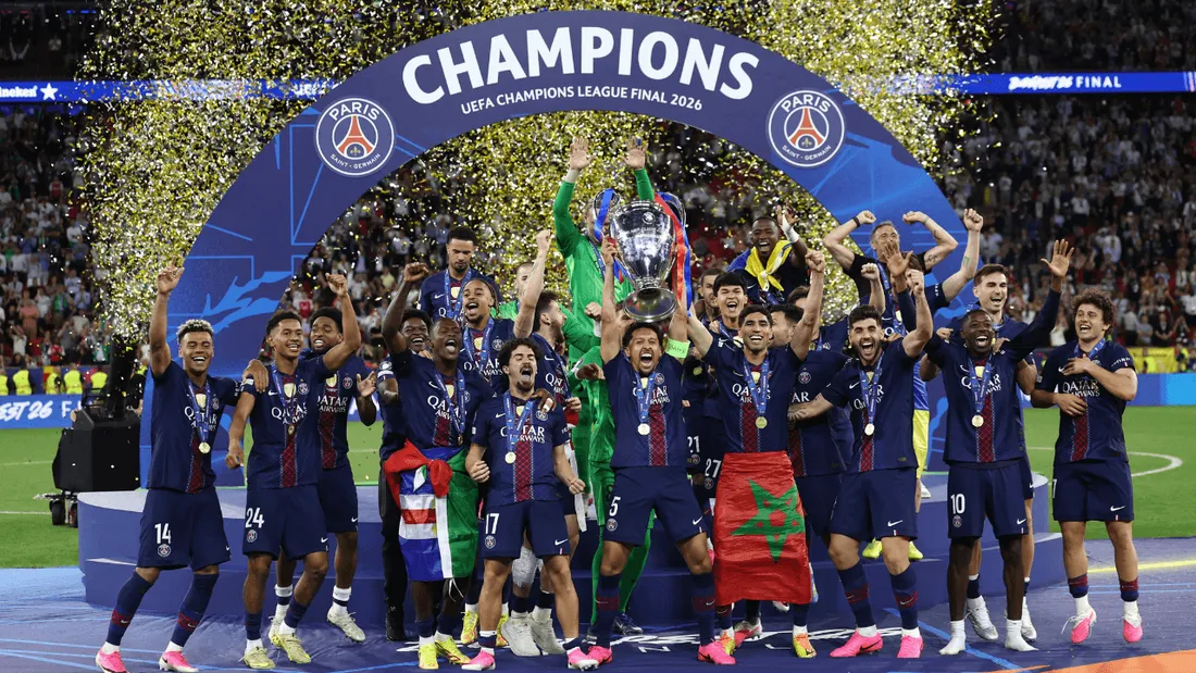 PSG players celebrate lifting the Champions League trophy for the second straight year