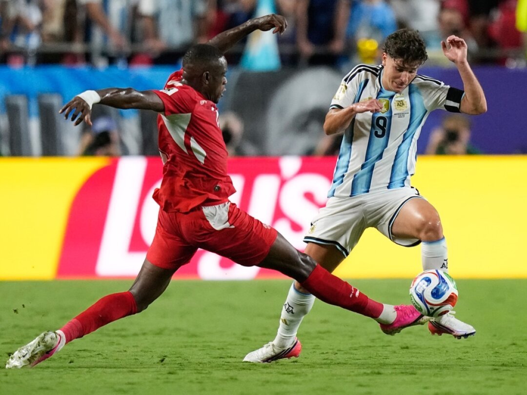 Argentina's Julián Álvarez celebrates scoring the decisive goal in extra time.