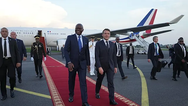 Gabonese President Brice Oligui Nguema in formal attire during a press event
