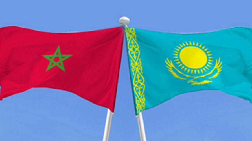 Kazakhstan and Morocco officials shake hands during economic discussions