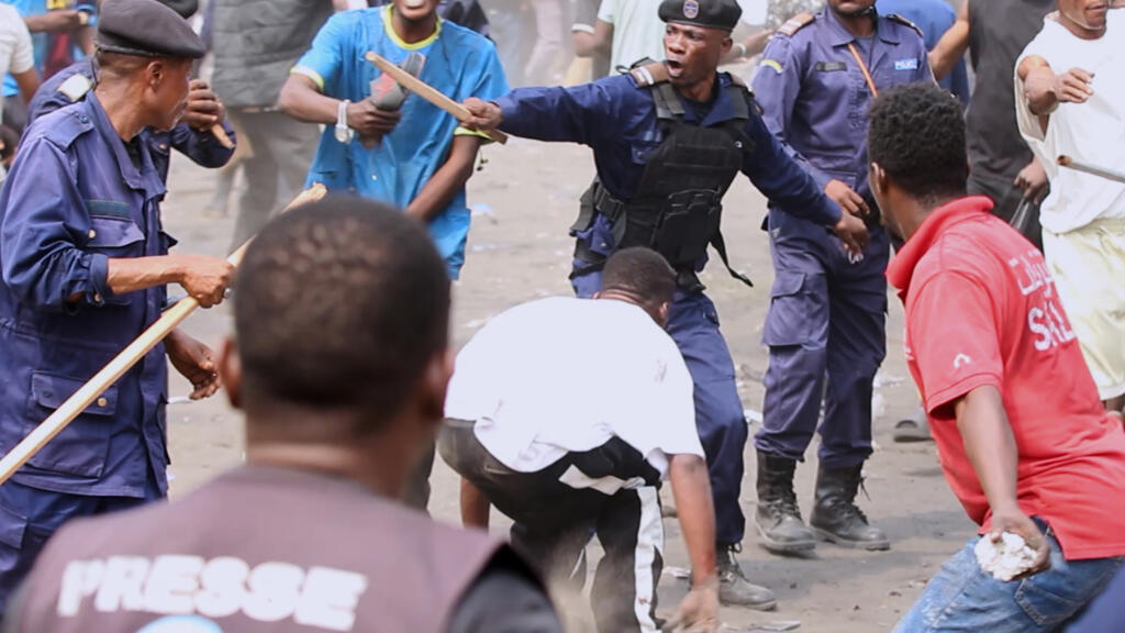 Clashes between police and protesters during a demonstration in Kinshasa, DRC, June 2026 (illustrative image).