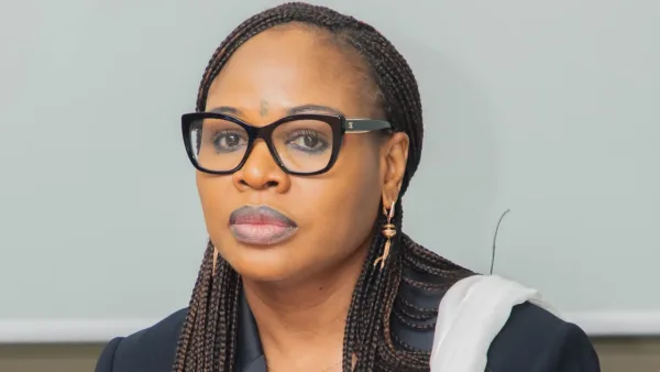 Benin’s Minister of SMEs and Employment Promotion, Awaou Baco, engaging with local entrepreneurs