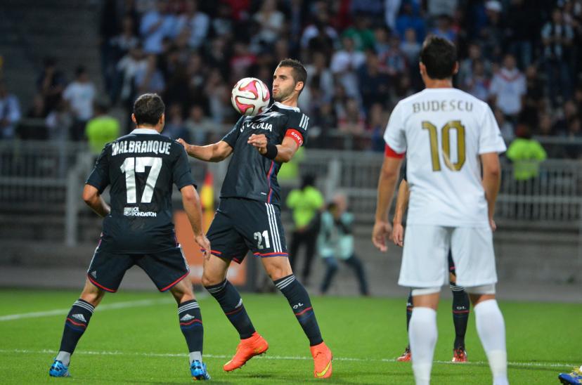 Steed Malbranque and Maxime Gonalons after the 1-2 defeat against Astra Giurgiu on August 21, 2014